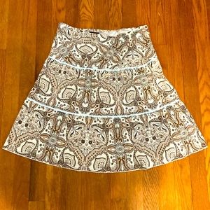 M selling a thrifted skirt that’s patterned.